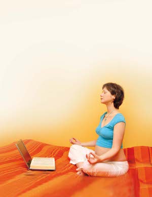 Pregnant woman doing yoga